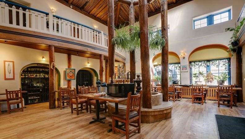 Taos Inn lobby with fountain facing the windows