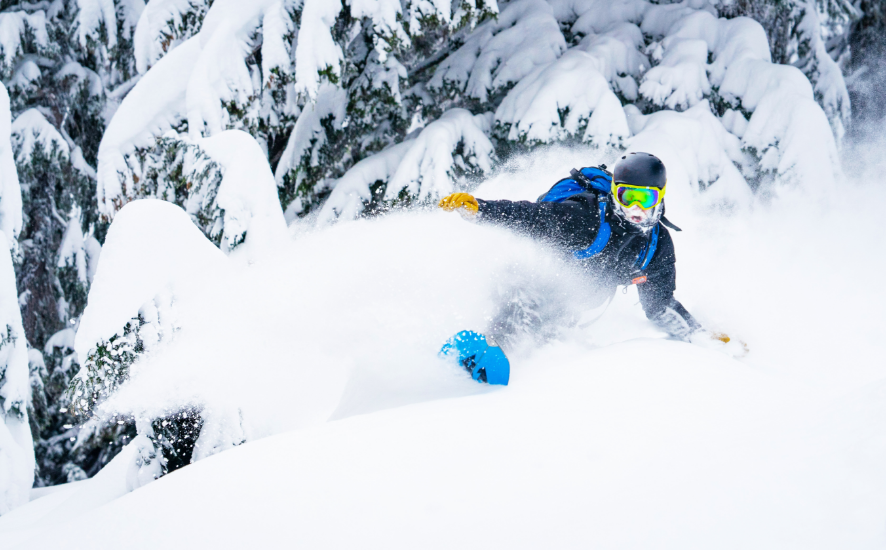 Snowboarder in powder