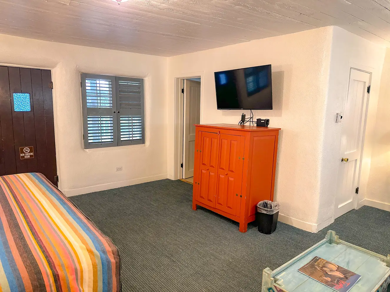 Cabinet and television in deluxe king room