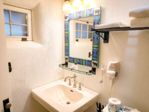 Sink and vanity in deluxe king ensuite bathroom