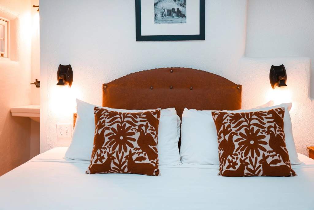 Bed, desk, and seating in king suite