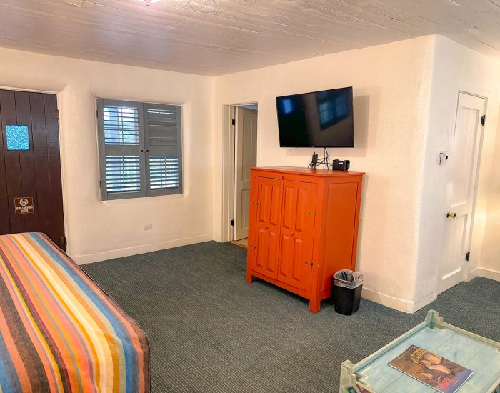 Cabinet and television in deluxe king room